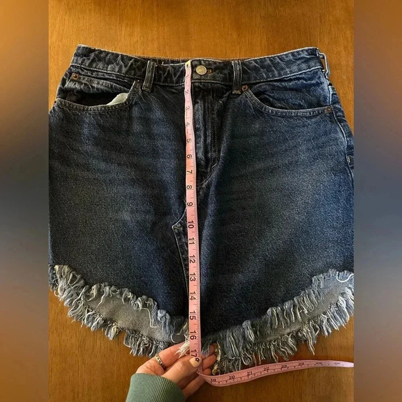 Free People We The Free Bailey Fringe Denim Mini Skirt. - Picture 7 of 10